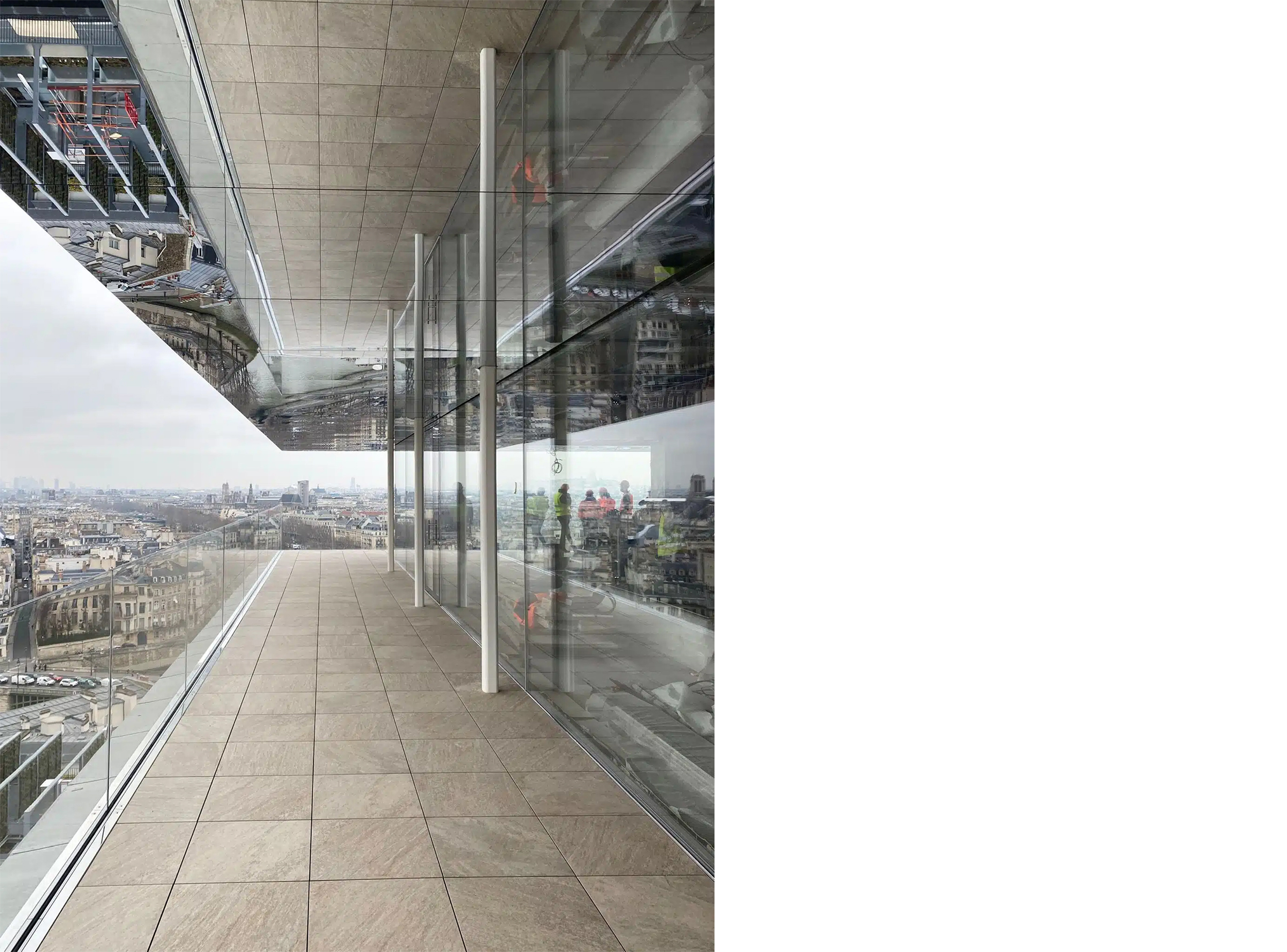 Public observation terrace on the fifteenth floor with panoramic views across Paris.