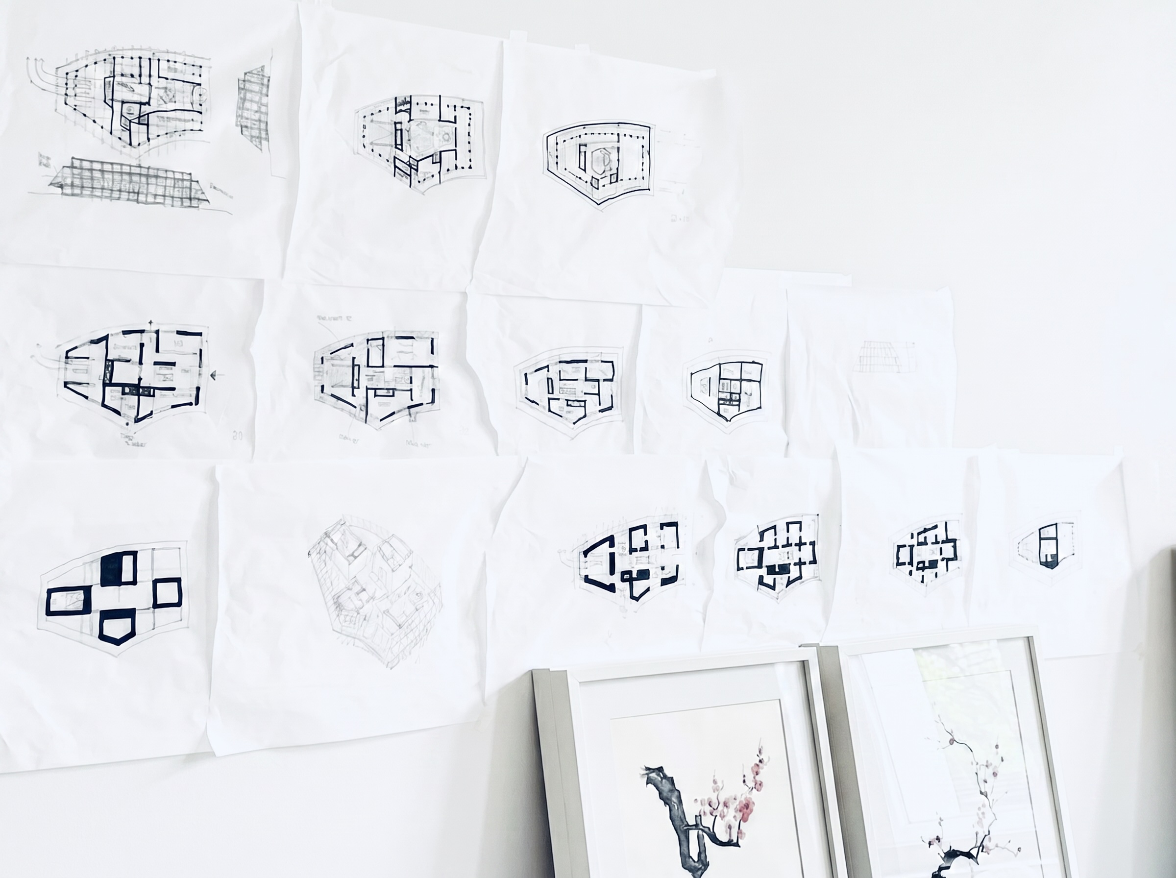 hand drawn sketches on a wall